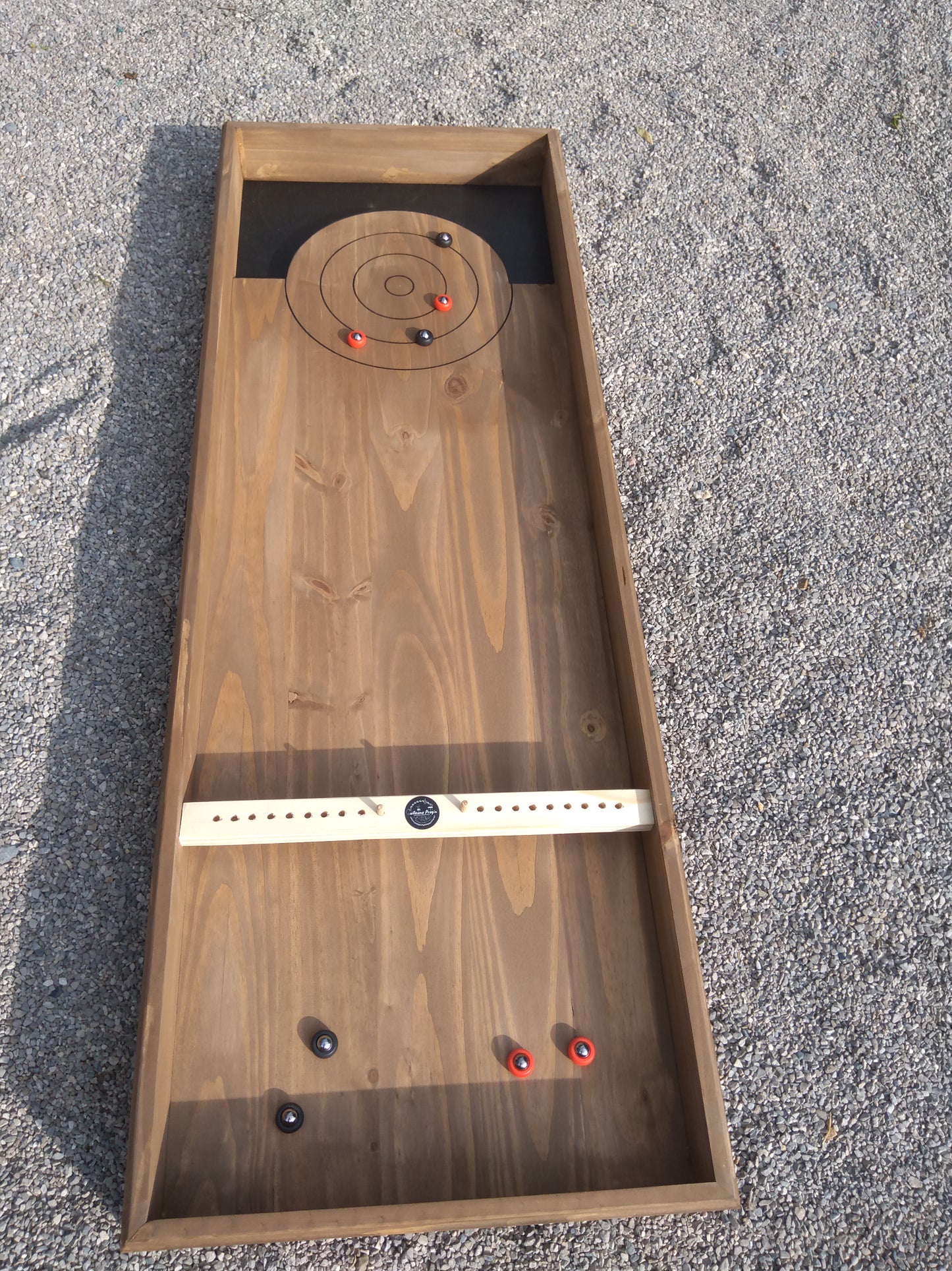 Jeu de curling disponible à la location (non expediable)