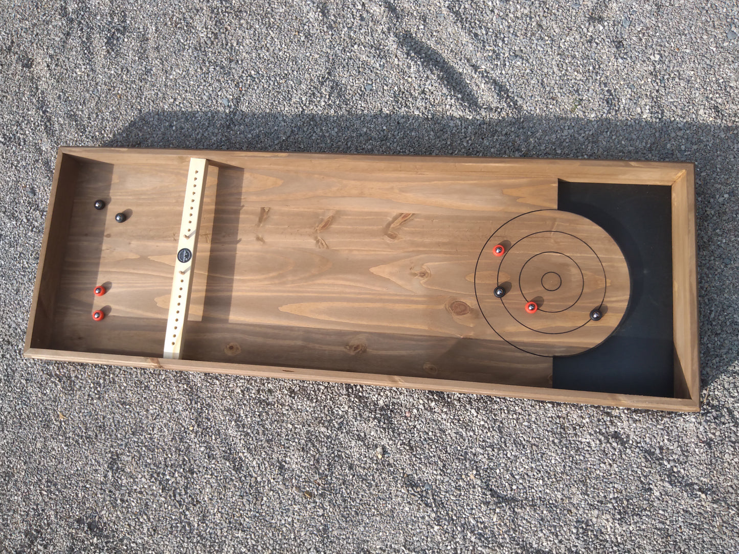 Jeu de curling disponible à la location (non expediable)