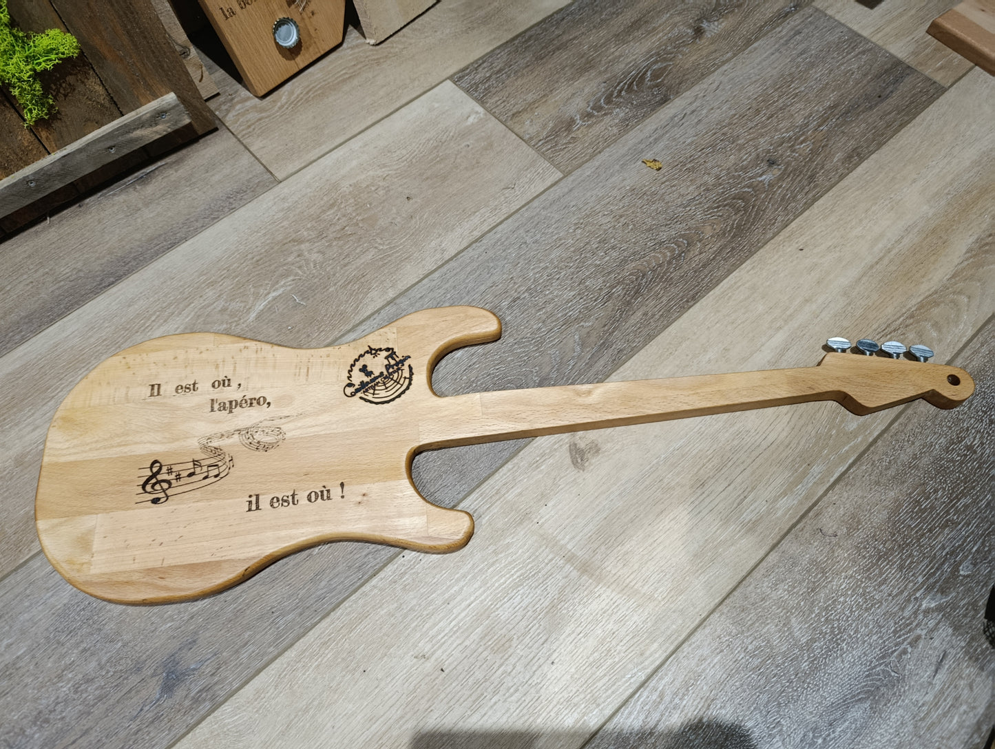 Guitar-themed appetizer board with a quote